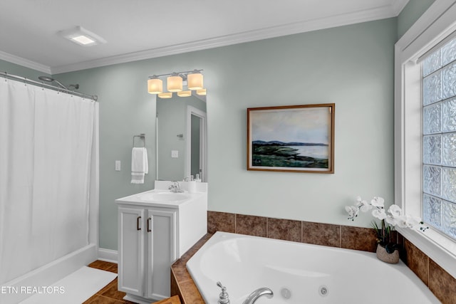 bathroom featuring tiled bath, crown molding, tile patterned flooring, and vanity