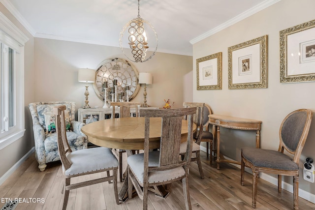 dining space featuring an inviting chandelier, wood-type flooring, and crown molding