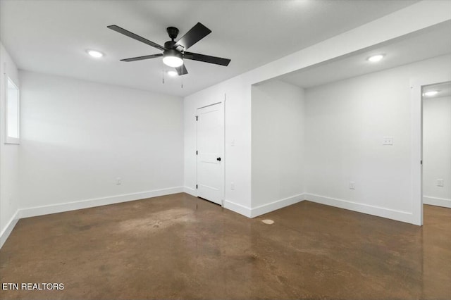 interior space with ceiling fan