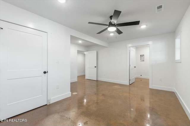 unfurnished bedroom featuring ceiling fan and concrete floors