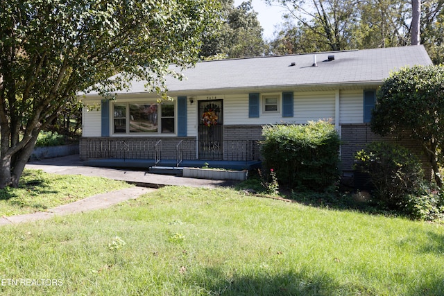 ranch-style house with a front yard