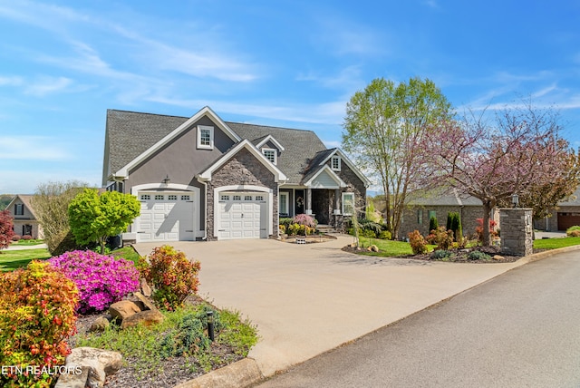 craftsman house featuring a garage