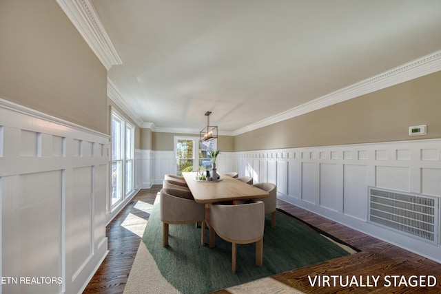 2011 Breakers Pt, Knoxville, TN 37922 - dining space with a decorative wall, ornamental molding, dark wood-type flooring, a wainscoted wall, and a chandelier