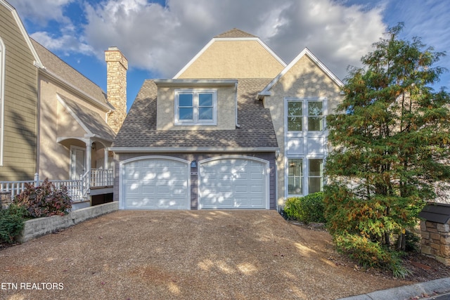 2011 Breakers Pt, Knoxville, TN 37922 - view of front of house featuring driveway, roof with shingles, and a chimney
