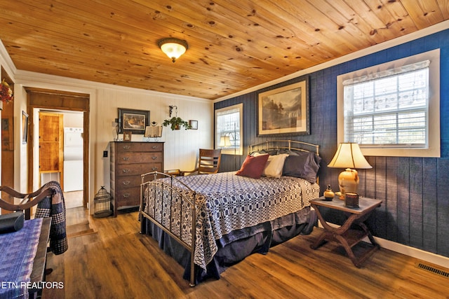 bedroom featuring fridge, wood ceiling, dark hardwood / wood-style floors, and multiple windows