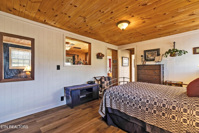 bedroom with hardwood / wood-style floors, wood ceiling, ornamental molding, and wood walls