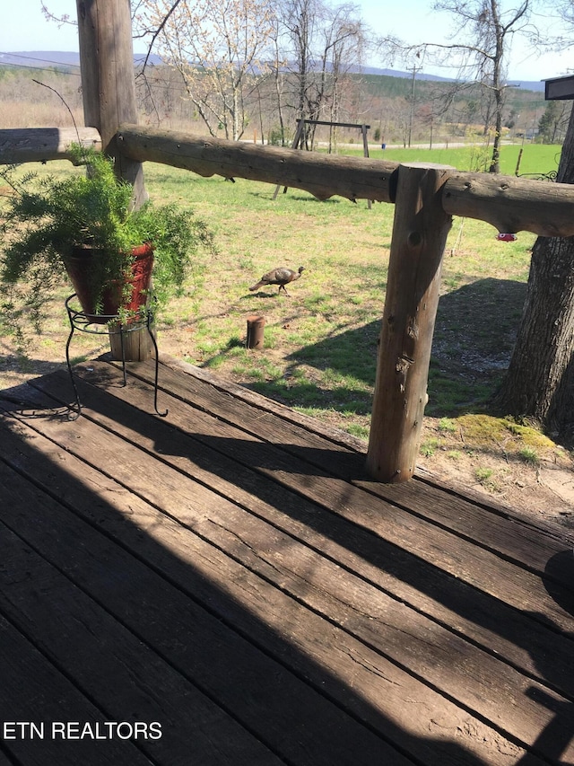 deck featuring a rural view