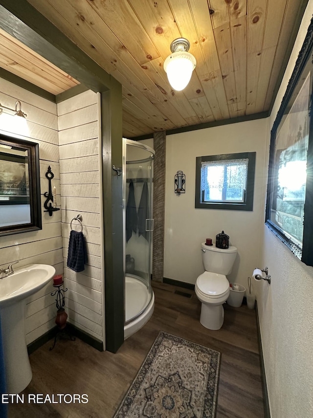 bathroom featuring toilet, an enclosed shower, wood ceiling, ornamental molding, and hardwood / wood-style flooring