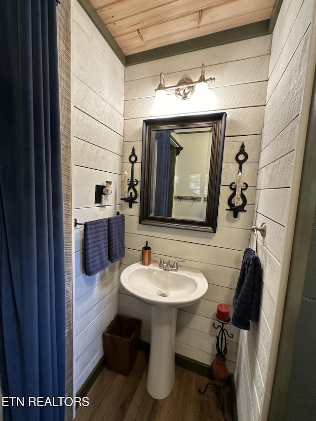 bathroom with wood ceiling, wooden walls, and wood-type flooring