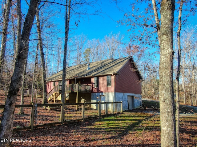 back of property featuring a balcony