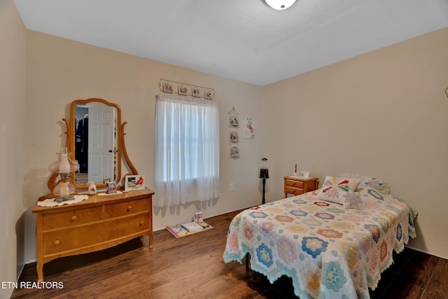 bedroom featuring hardwood / wood-style flooring