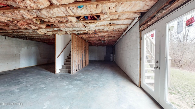 170 Mallory Dr, New Tazewell, TN 37825 - below grade area with stairs, healthy amount of natural light, and concrete block wall