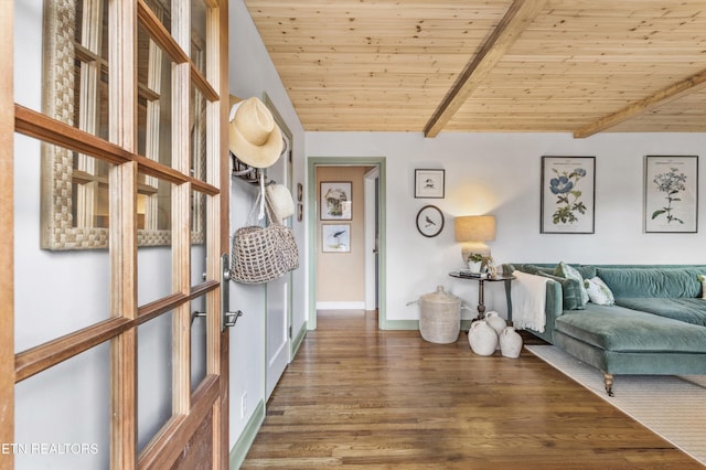 sitting room with lofted ceiling with beams, wood-type flooring, and wood ceiling