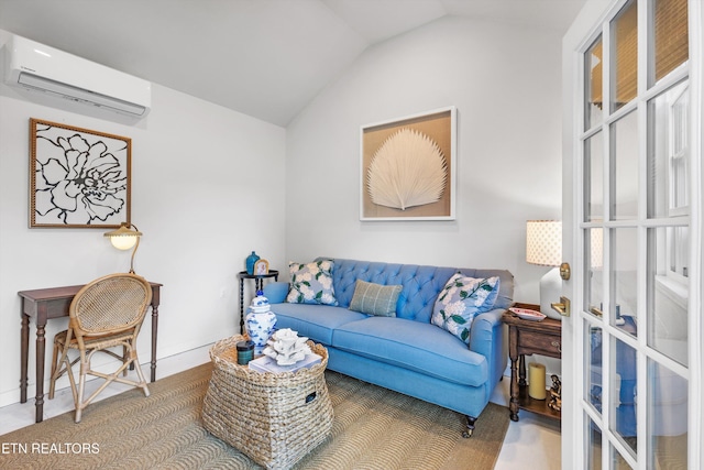 living room featuring vaulted ceiling and a wall unit AC