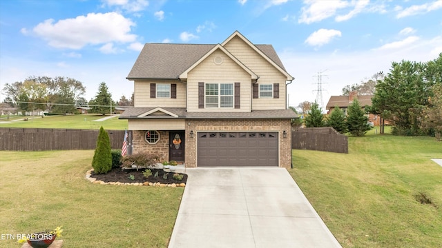 view of front of house with a front lawn and a garage