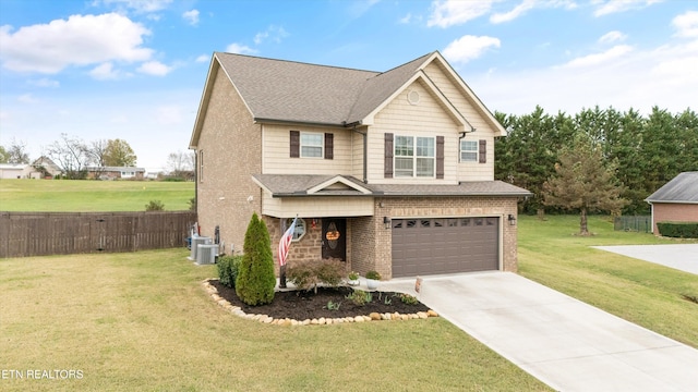 view of front of house featuring a front yard and a garage