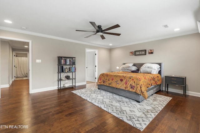 bedroom featuring dark hardwood / wood-style floors, ceiling fan, and crown molding