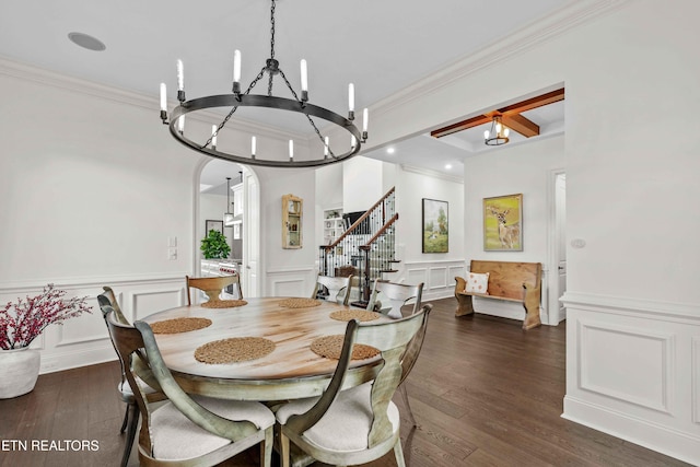 dining area with crown molding, an inviting chandelier, dark hardwood / wood-style flooring, and beam ceiling