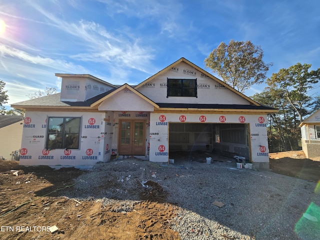 property under construction featuring french doors