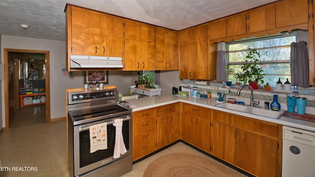 kitchen featuring sink, a textured ceiling, stainless steel electric range oven, and dishwasher