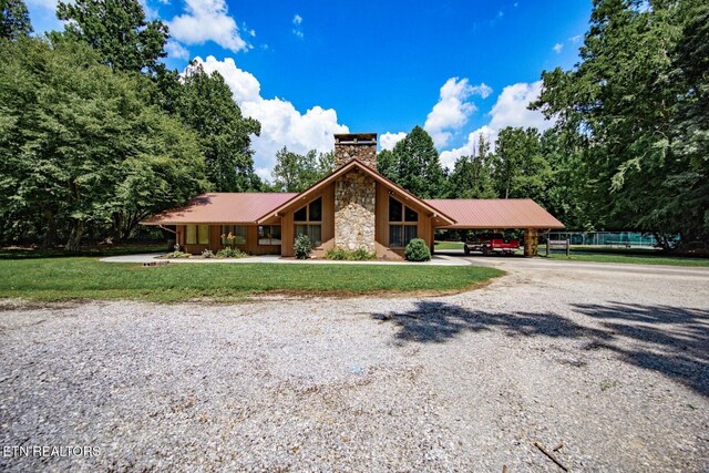 ranch-style house with a carport