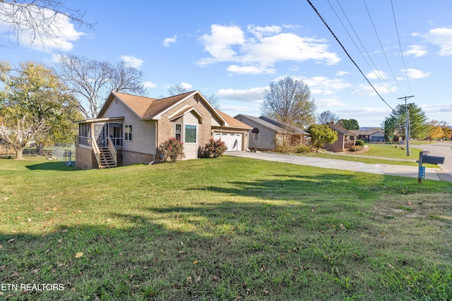 single story home with a front yard, a garage, and a sunroom