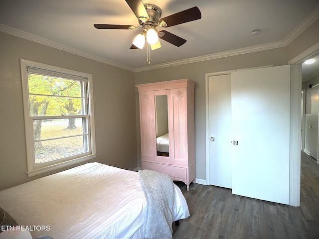 bedroom with ceiling fan, crown molding, and dark hardwood / wood-style floors