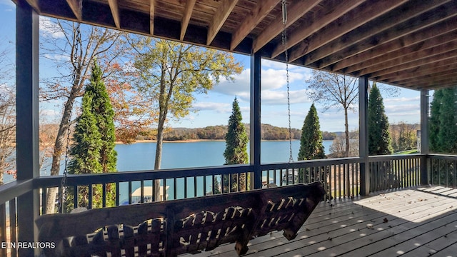 deck featuring a water view