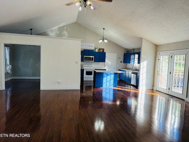 unfurnished living room with ceiling fan with notable chandelier, a textured ceiling, sink, high vaulted ceiling, and dark hardwood / wood-style floors