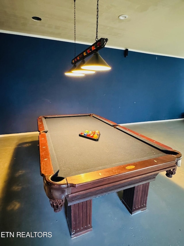 rec room with pool table and concrete floors