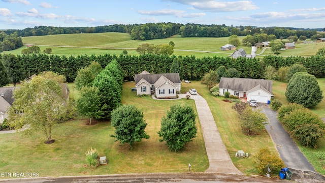 birds eye view of property featuring a rural view