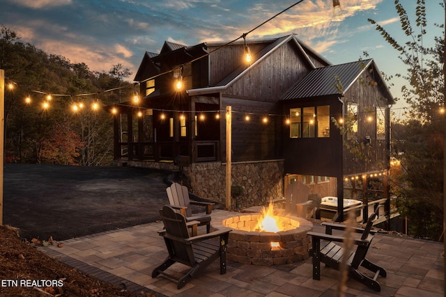 view of patio featuring a fire pit