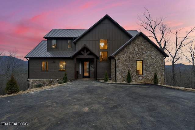 modern inspired farmhouse featuring a mountain view