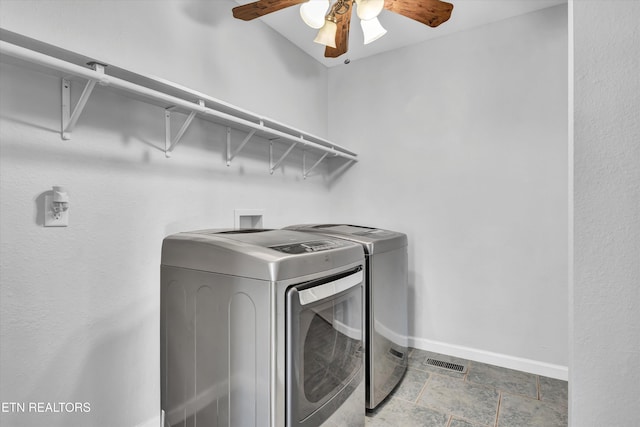 laundry room with washing machine and dryer and ceiling fan