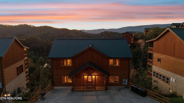 log home featuring a mountain view