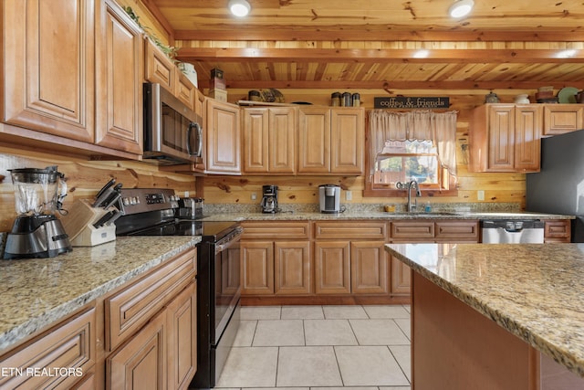 kitchen featuring stainless steel appliances, light stone countertops, wood ceiling, and sink