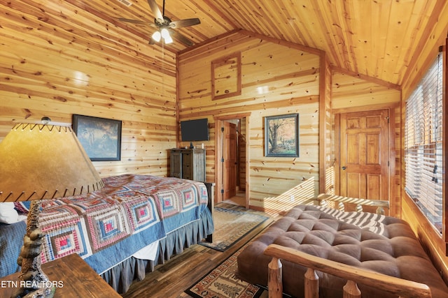 bedroom with wooden walls, hardwood / wood-style flooring, ceiling fan, and wooden ceiling