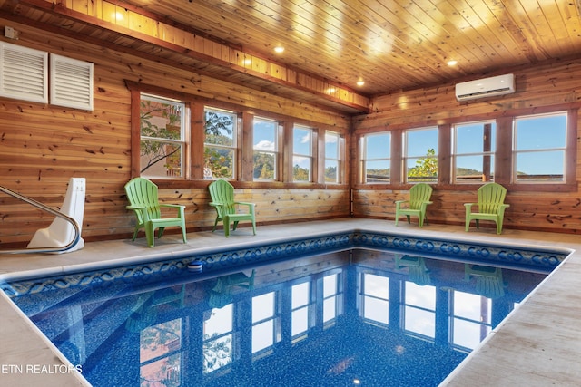 view of pool featuring an AC wall unit