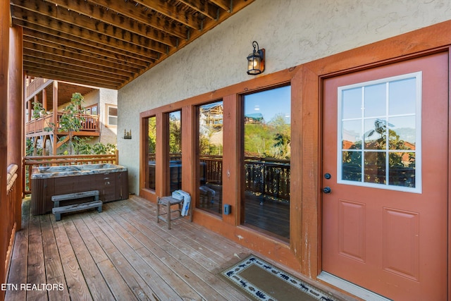 entrance to property featuring a hot tub