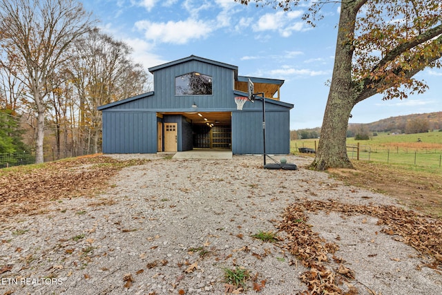 view of outdoor structure featuring a rural view