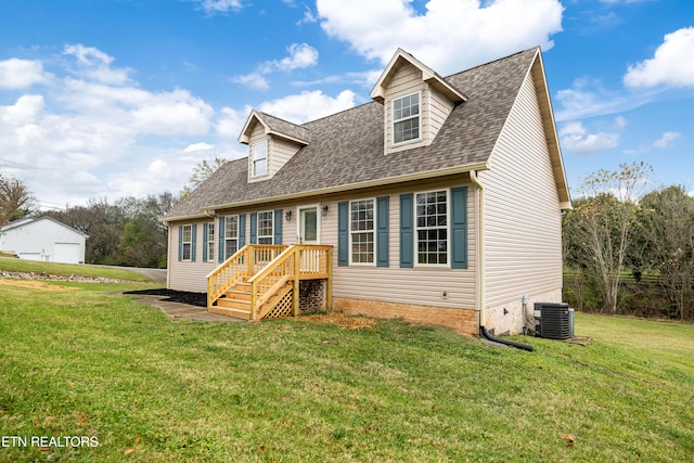 cape cod-style house featuring central AC and a front yard