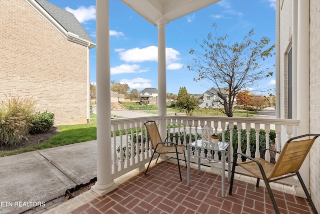 balcony featuring covered porch