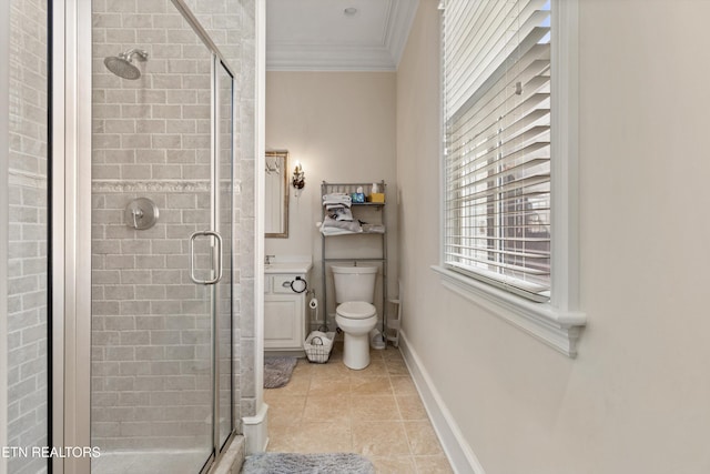 bathroom with toilet, crown molding, tile patterned floors, and a shower with door