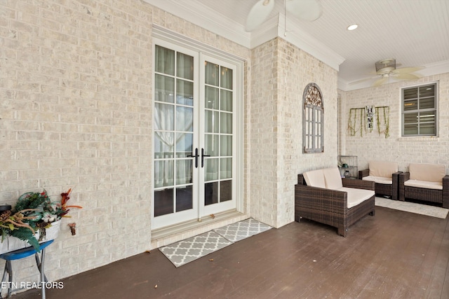 view of patio featuring ceiling fan and french doors