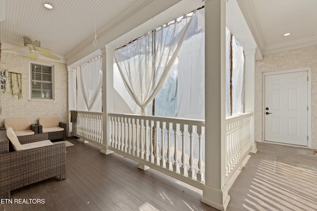 wooden terrace with ceiling fan