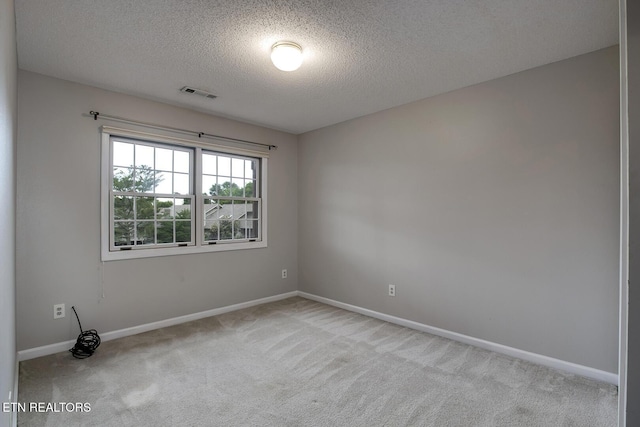 105 Poteau Trce, Loudon, TN 37774 - unfurnished room featuring carpet, a textured ceiling, and baseboards