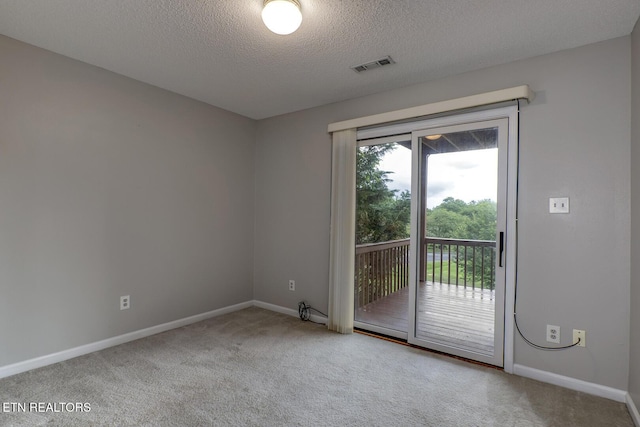 105 Poteau Trce, Loudon, TN 37774 - spare room featuring carpet flooring, a textured ceiling, and baseboards