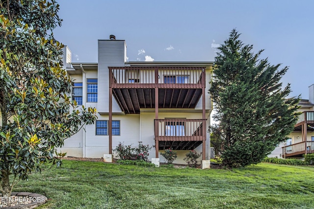 105 Poteau Trce, Loudon, TN 37774 - back of property with a balcony, a yard, and a chimney