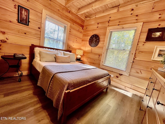 bedroom featuring wooden ceiling, wood-type flooring, beam ceiling, and wooden walls