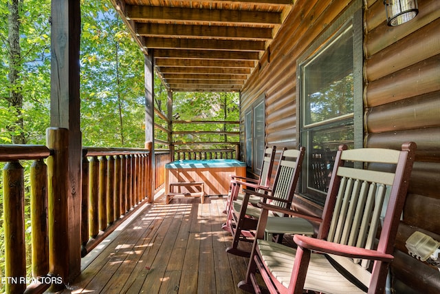 wooden terrace featuring a porch